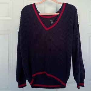 Navy blue and red v neck sweater